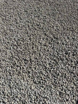 Stockpile of Nailstorm Quarts decorative stone at the Landscape Supply yard